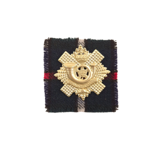 Highland Light Infantry of Canada – Cap badge with tartan