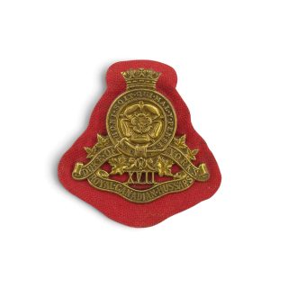17th Duke of York’s (Royal Canadian Hussars) – Cap badge with backing